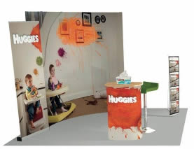 support de communication pour salon Huggies